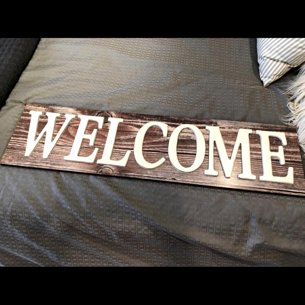 “Welcome” sign